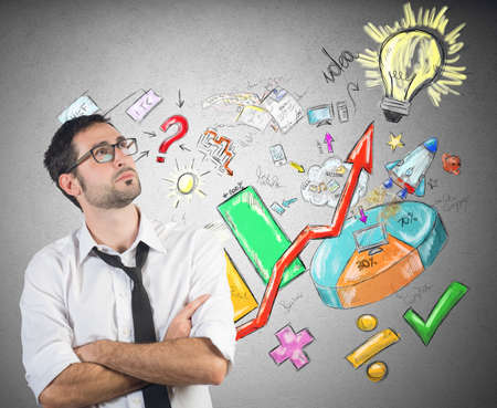 A businessman creates a system to succeedの写真素材