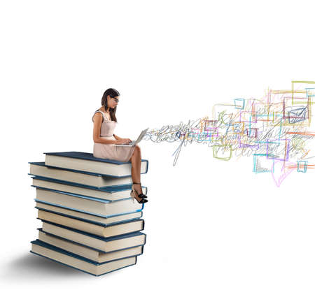 Women work with laptop on the booksの写真素材