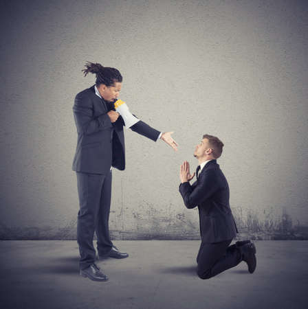 Angry boss dismisses his employee by companyの写真素材