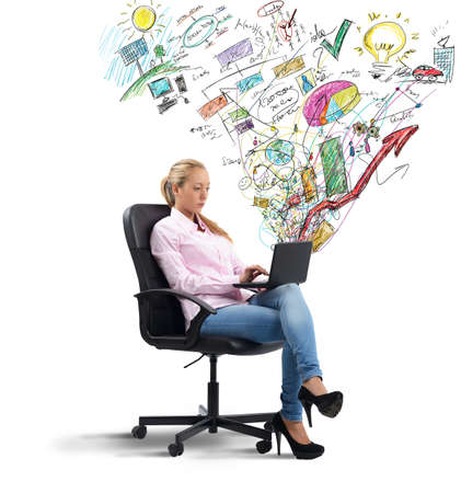 Businesswoman working on her project analyzing profitsの写真素材