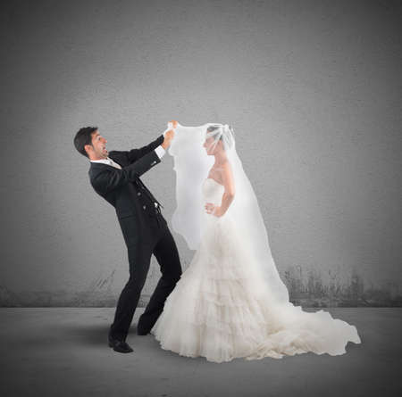 Amazed husband lifts the veil of wife