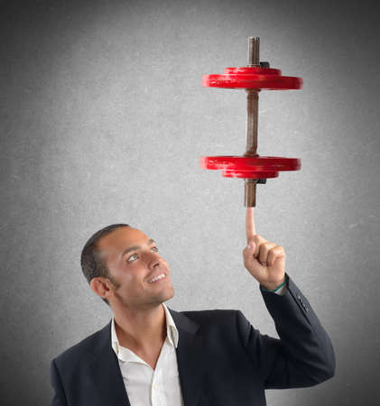 Businessman tests his mental and physical concentrationの写真素材