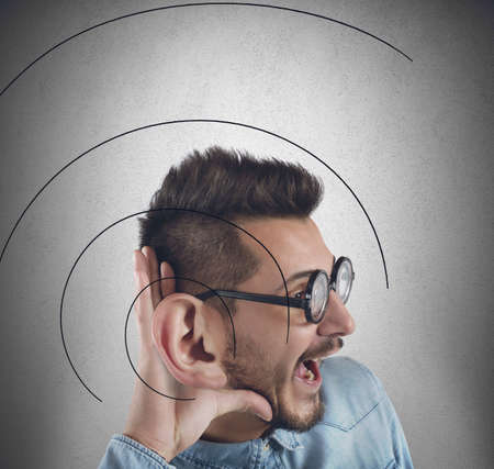 Man has a great ear to listen betterの写真素材