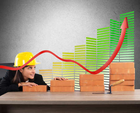 Woman architect currency savings and energy efficiencyの写真素材