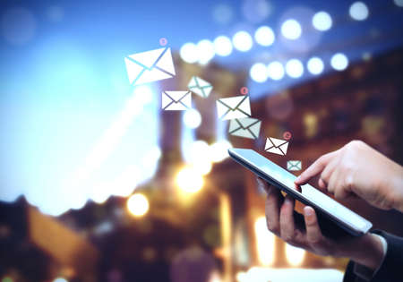 Messages anywhere and to anyone with tabletの写真素材