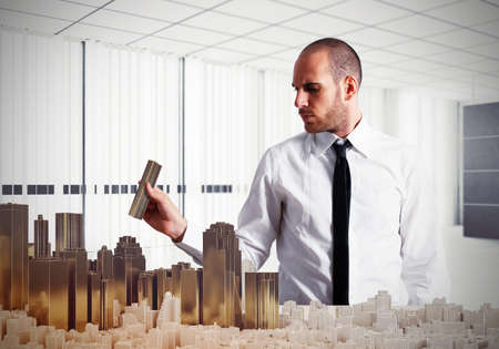 Engineer builds in his office plastic urbanの写真素材