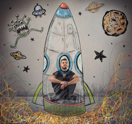 Man imagines himself to be an astronautの写真素材