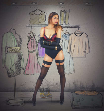 Sexy girl in lingerie choose what wearの写真素材