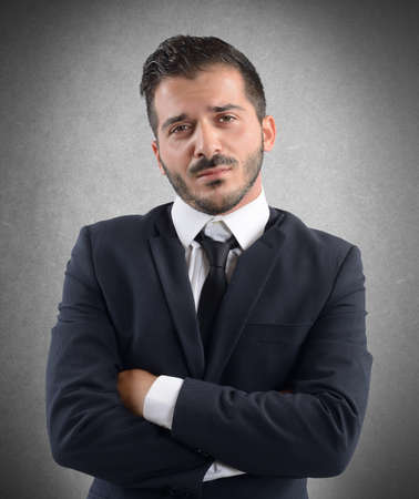 Businessman demoralized by the problems of companyの写真素材