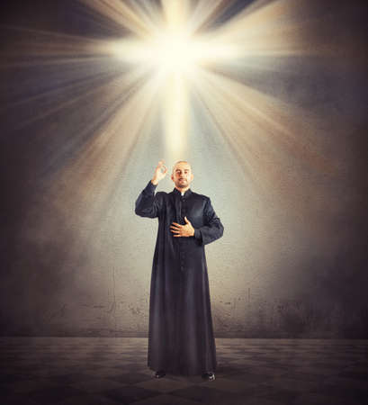 Priest is a blessing to the faithfulの写真素材