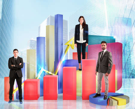Business team on financial graphs and statisticsの写真素材