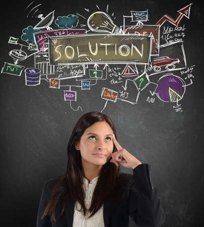 Businesswoman thinking about a plan working solution