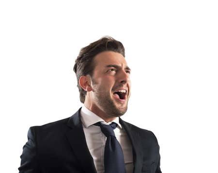 Business man pissed and furious at workの写真素材