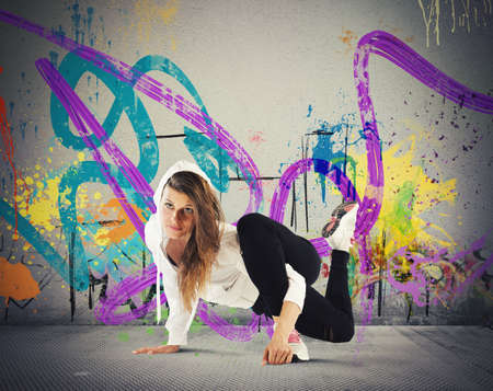 Street agile ballerina with hoody dance breakdanceの写真素材