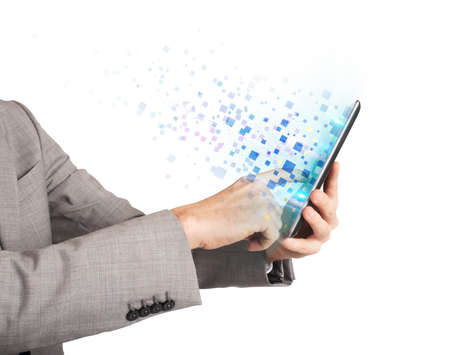 Businessman surfing the internet with the tabletの写真素材