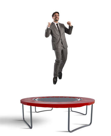 Man jumps on a trampoline increasingly topの写真素材