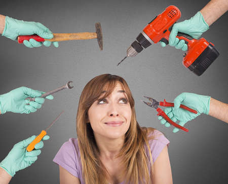 Frightened girl from crazy tools of dentistの写真素材