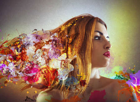 Contour girl with flowers in her hairの写真素材