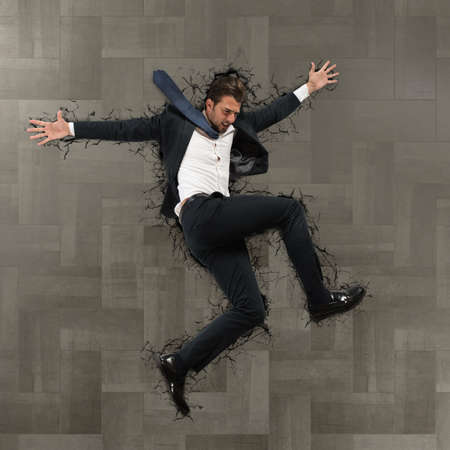 Man falls from above breaks the floorの写真素材