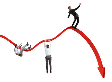 Businessmen falling down toward the economic crisisの写真素材