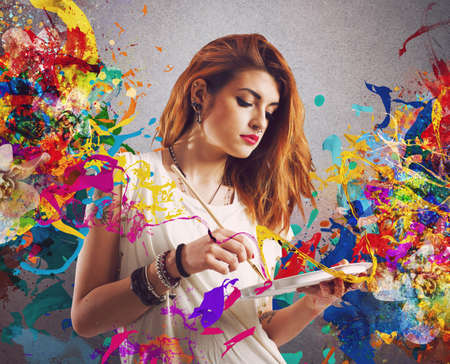 Creative woman painter with brush and paletteの写真素材