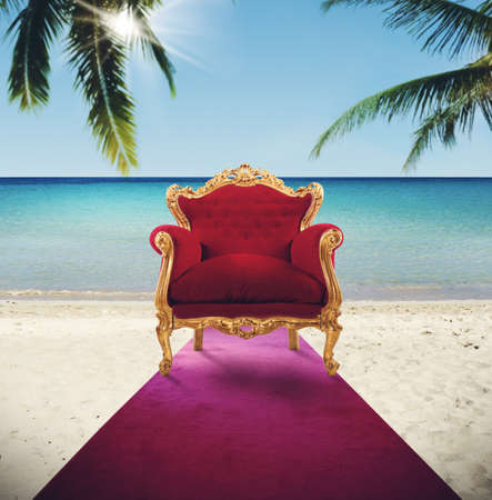 Armchair in red carpet on tropical beach