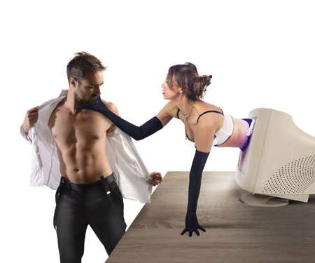Woman coming out of computer to seduceの写真素材