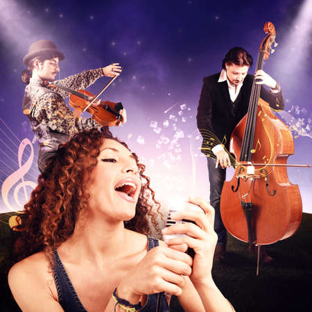 Orchestra and singer sound under the starsの写真素材