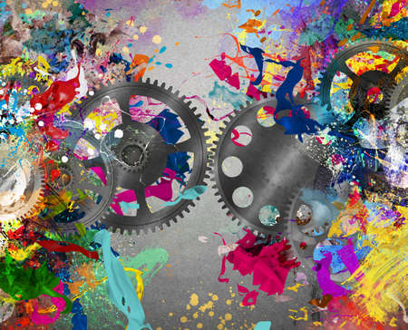 Gears on background of colorful splash paintingの写真素材
