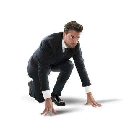 Businessman determined at the start of raceの写真素材