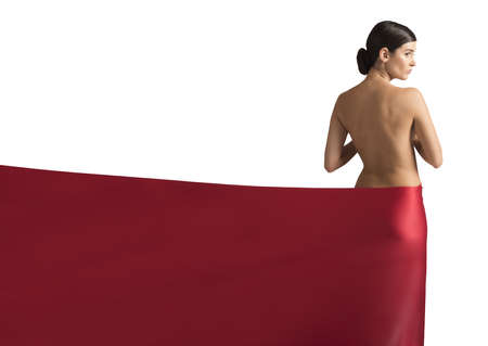 Woman covered only by a red veilの写真素材