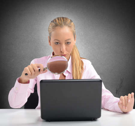 Woman controls and protects PC as firewallの写真素材