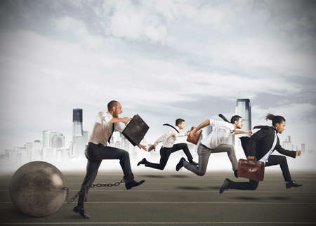 Men competing with a man with obstacleの写真素材