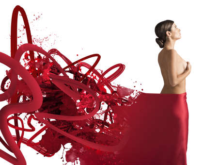 Naked woman covered with a red veilの写真素材