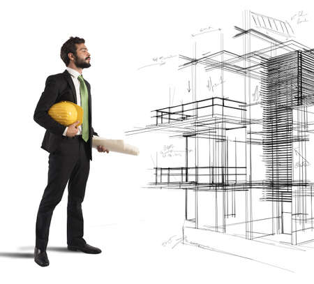 Young architect imagines his new construction projectの写真素材