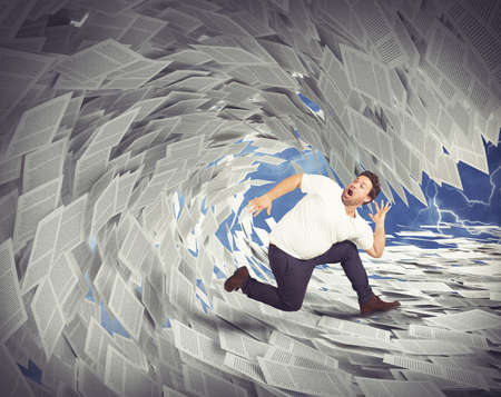 Man runs away from wave of sheetsの写真素材