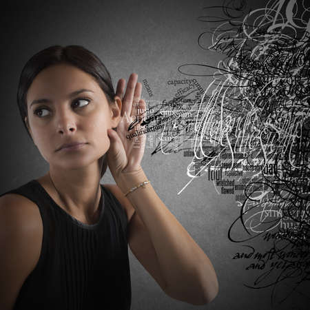 Confused Woman listen to words in disorderの写真素材