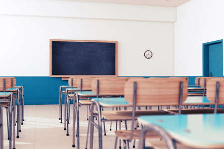 Empty school classroom with desks and chairsの写真素材