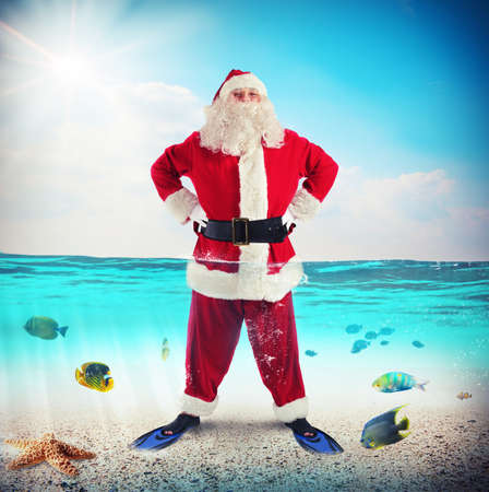 Man dressed as Santa Claus with finsの写真素材