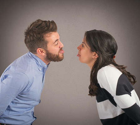 Man and woman playing are made grimaces