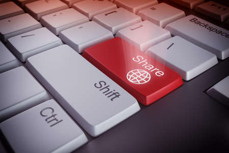 Computer keyboard with a share red keyの写真素材
