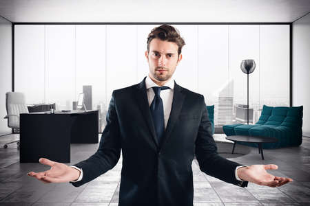 Successful businessman in his luxury executive officeの写真素材