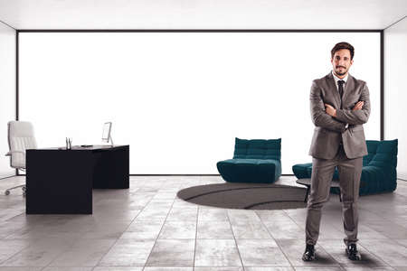 Successful businessman in his luxury executive officeの写真素材