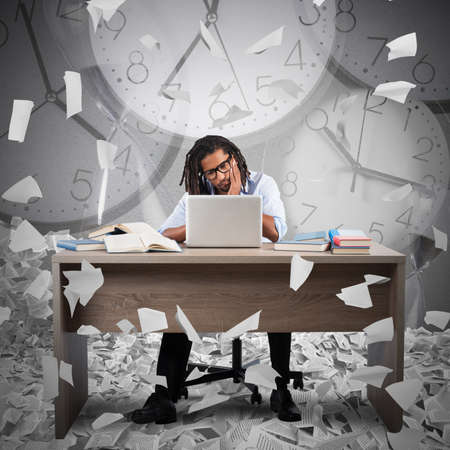 Businessman with bored expression and clock backgroundの写真素材