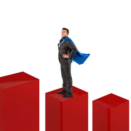 Businessman dressed as a hero on statisticの写真素材
