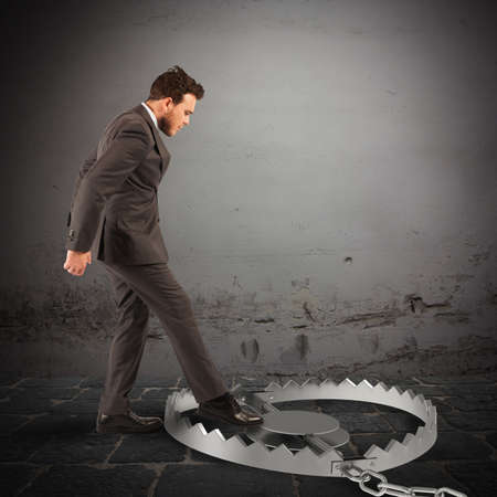 Man puts his leg in a trapの写真素材