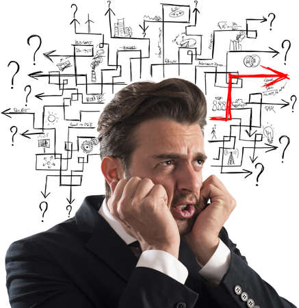 Worried man finds the difficult maze solutionの写真素材