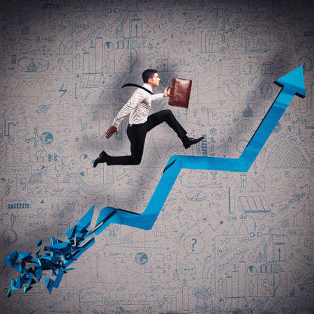 Businessman runs quickly on a broken arrowの写真素材