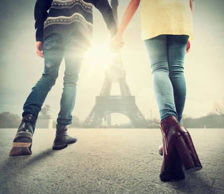 Couple in love walks together in Parisの写真素材