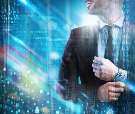 Man with clock with futuristic blue backgroundの写真素材